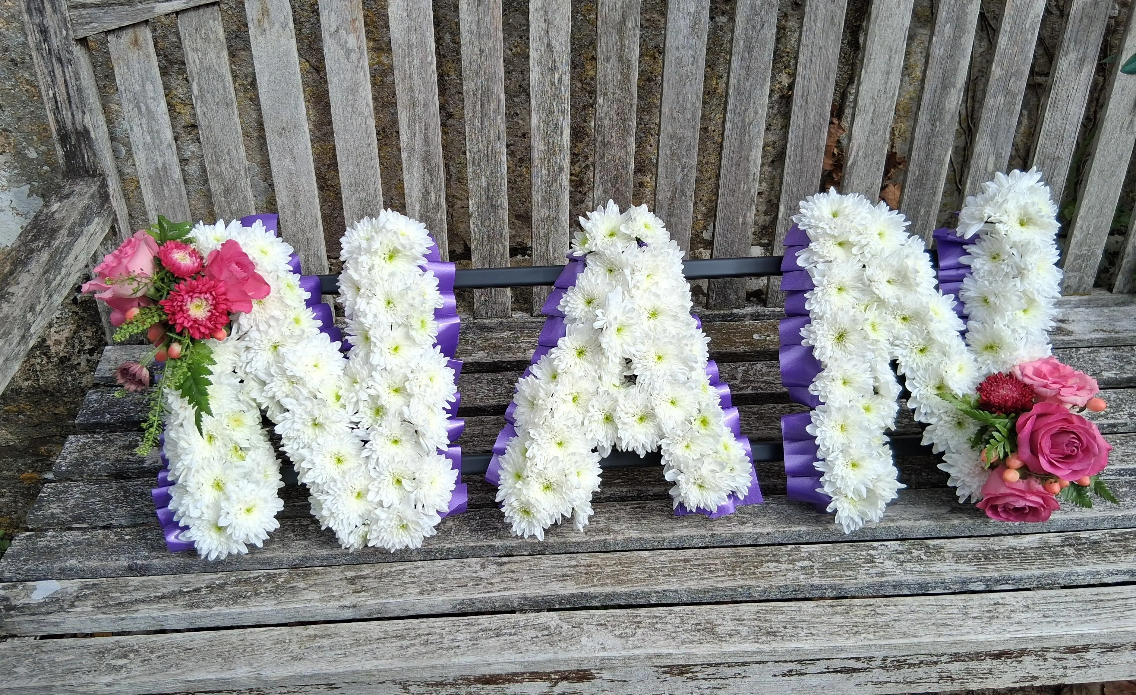 Cross-shaped floral tribute